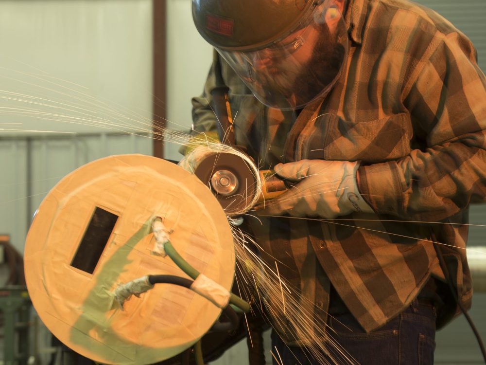 M. Davis & Sons Pipe Fabrication Tech M. Davis & Sons fabrication specialist grinding