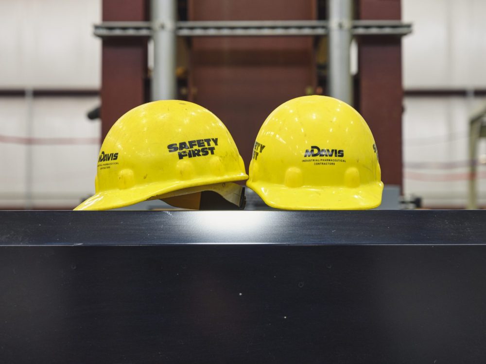 M. Davis & Sons hardhats with safety logo